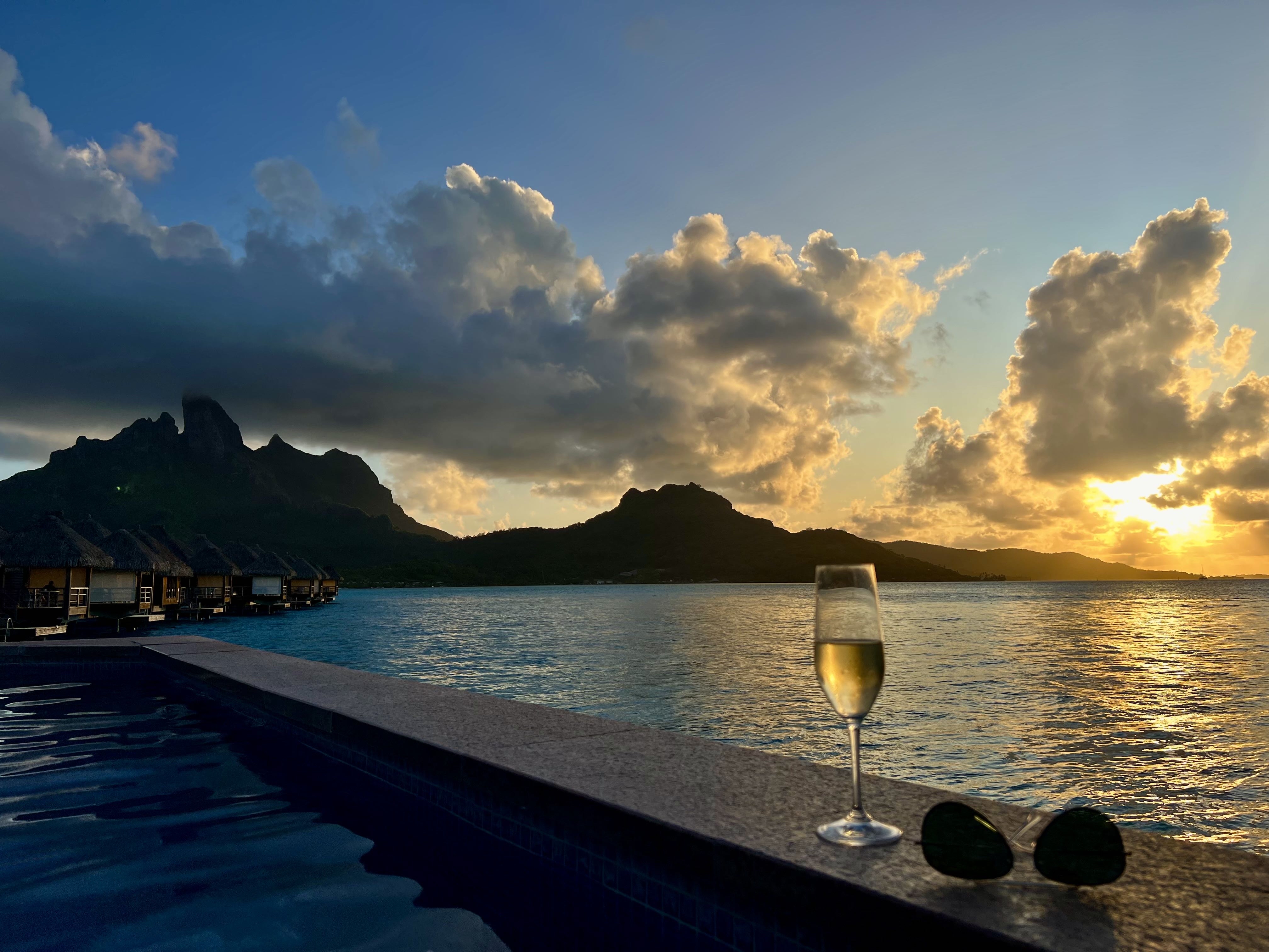 Champagne at sunset overlooking the mountains of Bora Bora